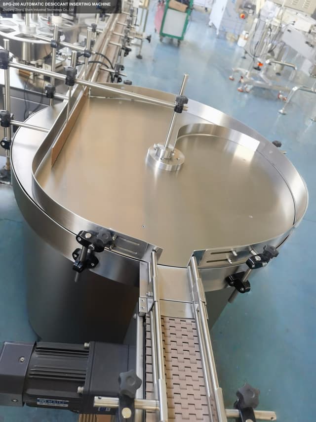 BPG-200 AUTOMATIC DESICCANT INSERTING MACHINE