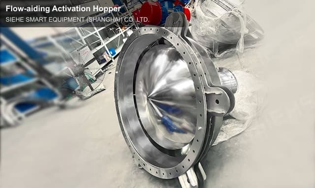 Flow-aiding Activation Hopper